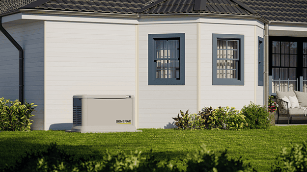Technician inspecting a Generac standby generator during home installation in Chatham-Kent.