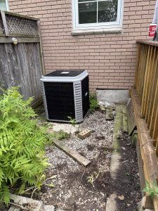 Older air conditioner before new AC installation in Chatham-Kent